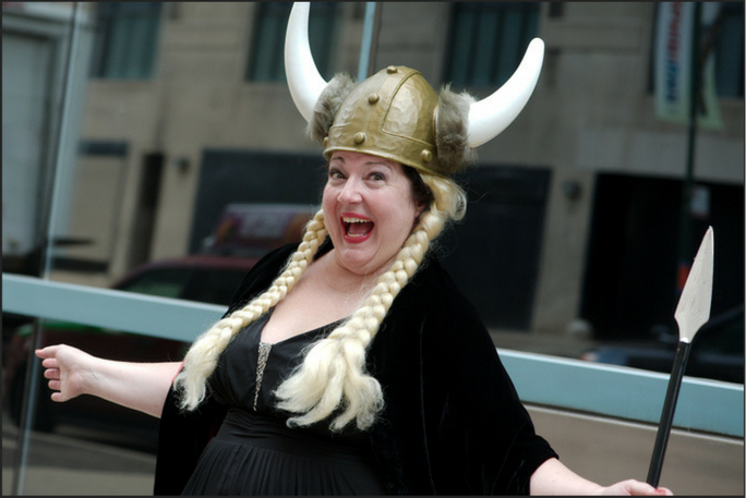 Rose Guccione in a Valkyrie helmet and braids